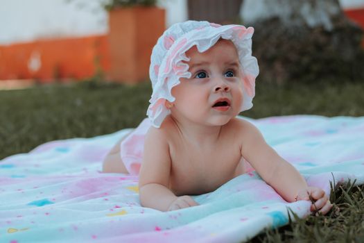 Cute Baby Lying on a Blanket