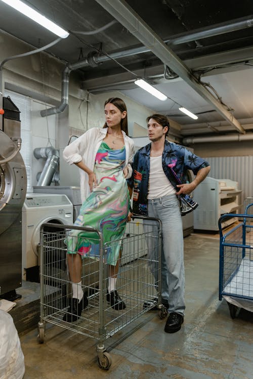 Man and Woman in Industrial Laundry Room