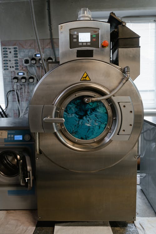  Washing Machine with Blue Clothes Inside