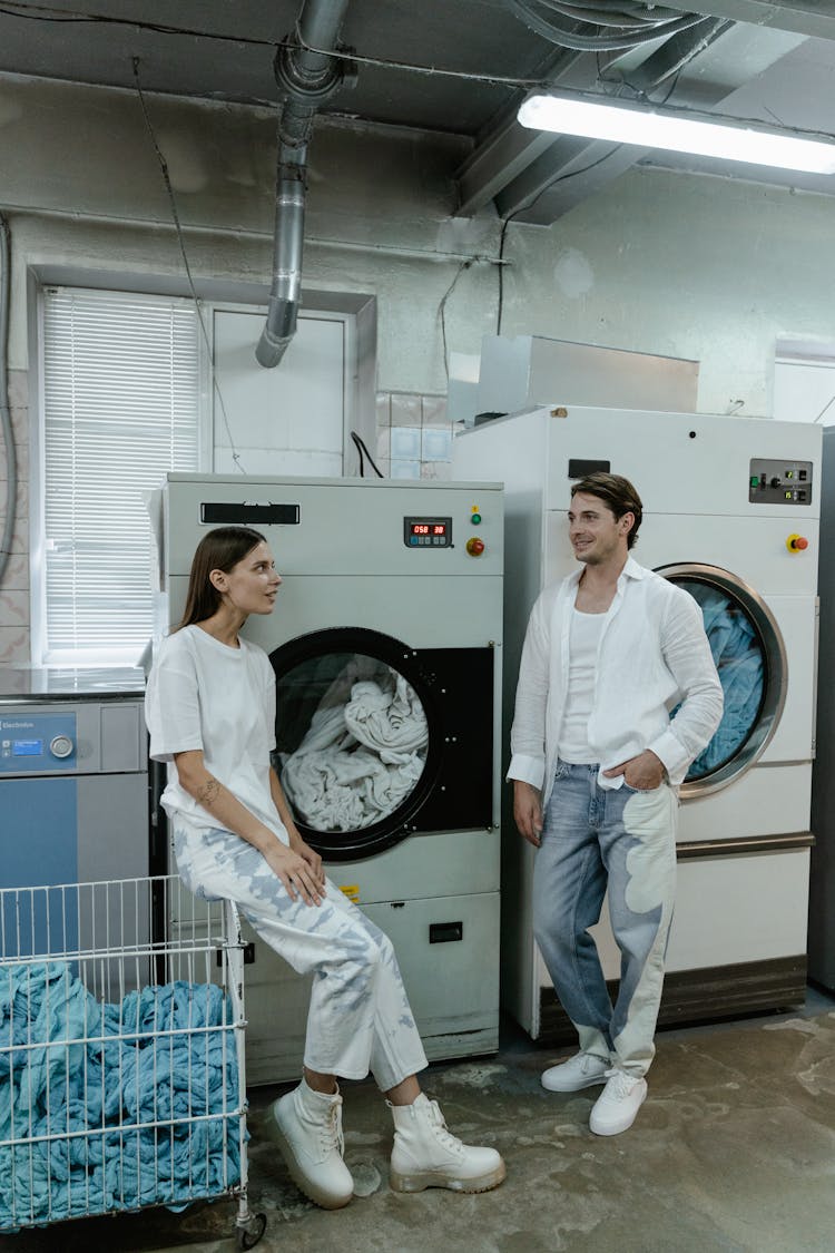 Man And Woman Wearing White Tops