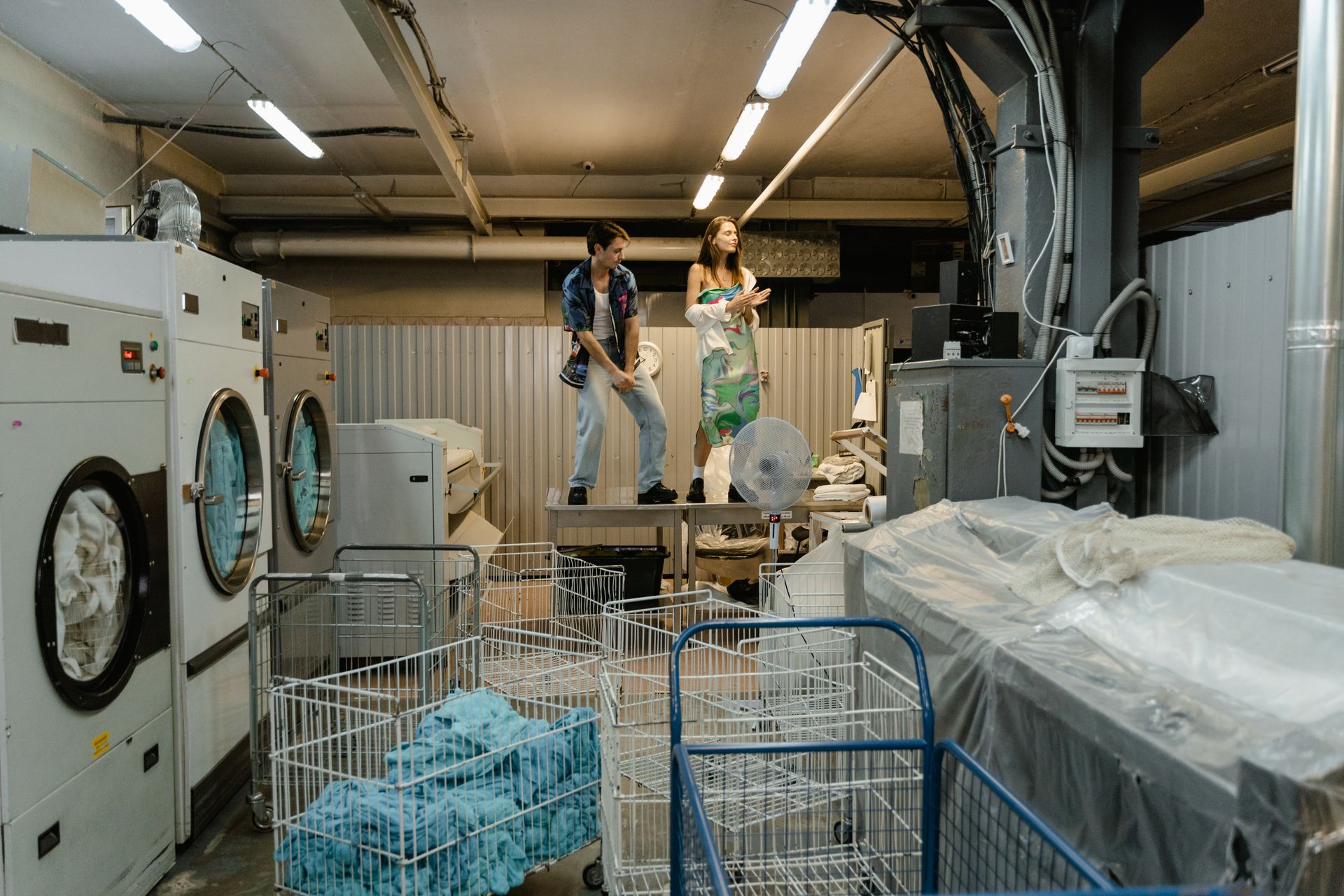Man in Woman in Laundry Room