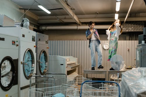 Man and Woman in Laundry Room