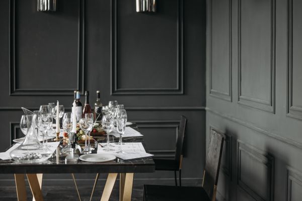 Beautifully arranged dining table with wine