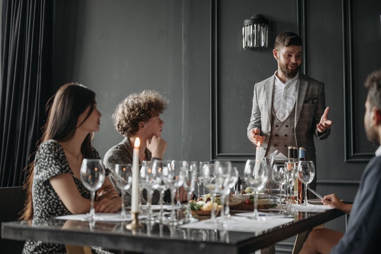 Friends Sitting At The Table