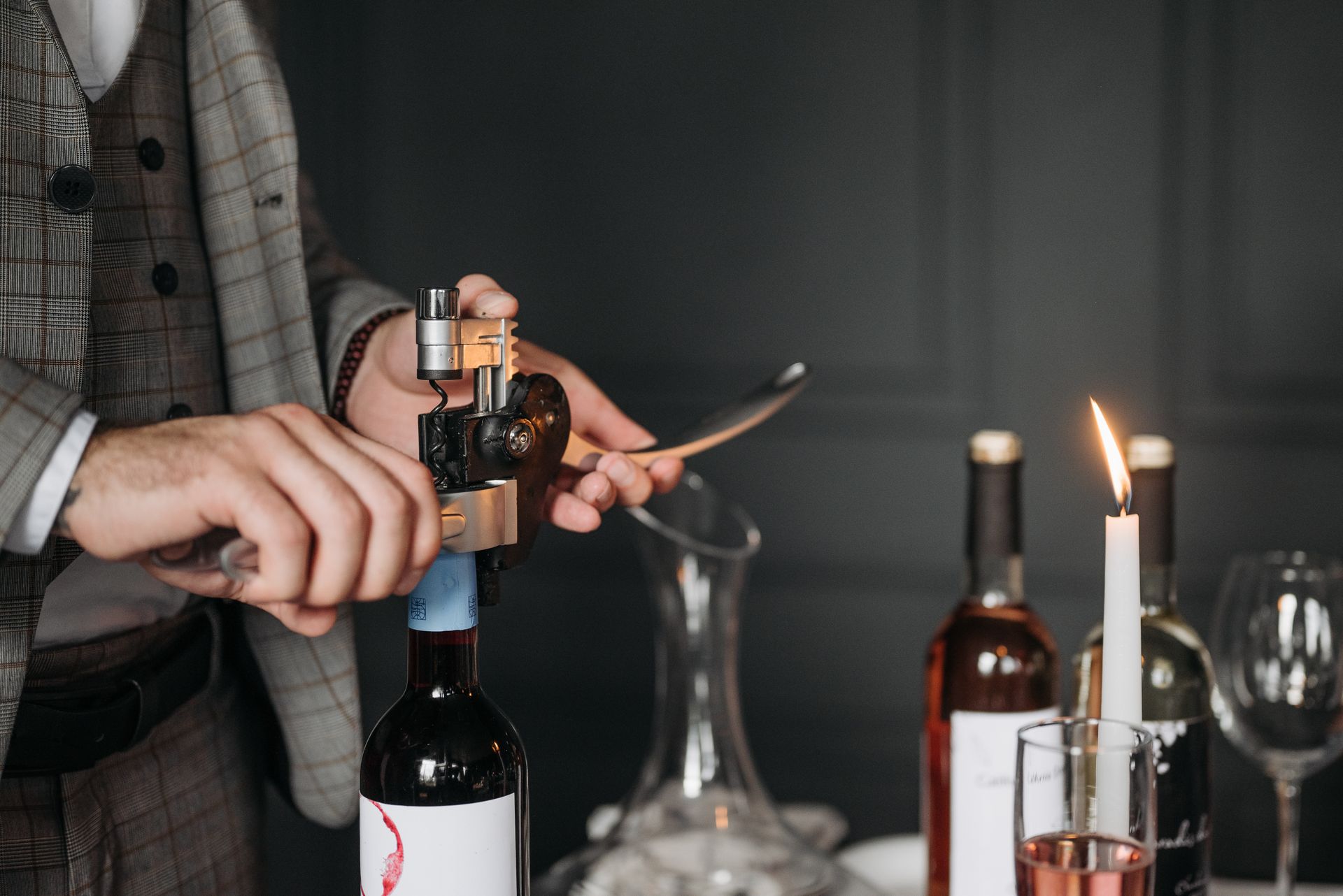 Person Holding a Corkscrew