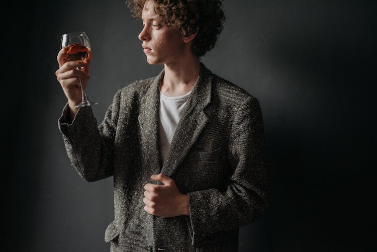 Man Staring At The Wine Glass