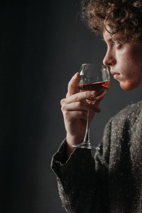 Portrait of Man Drinking Red Wine 