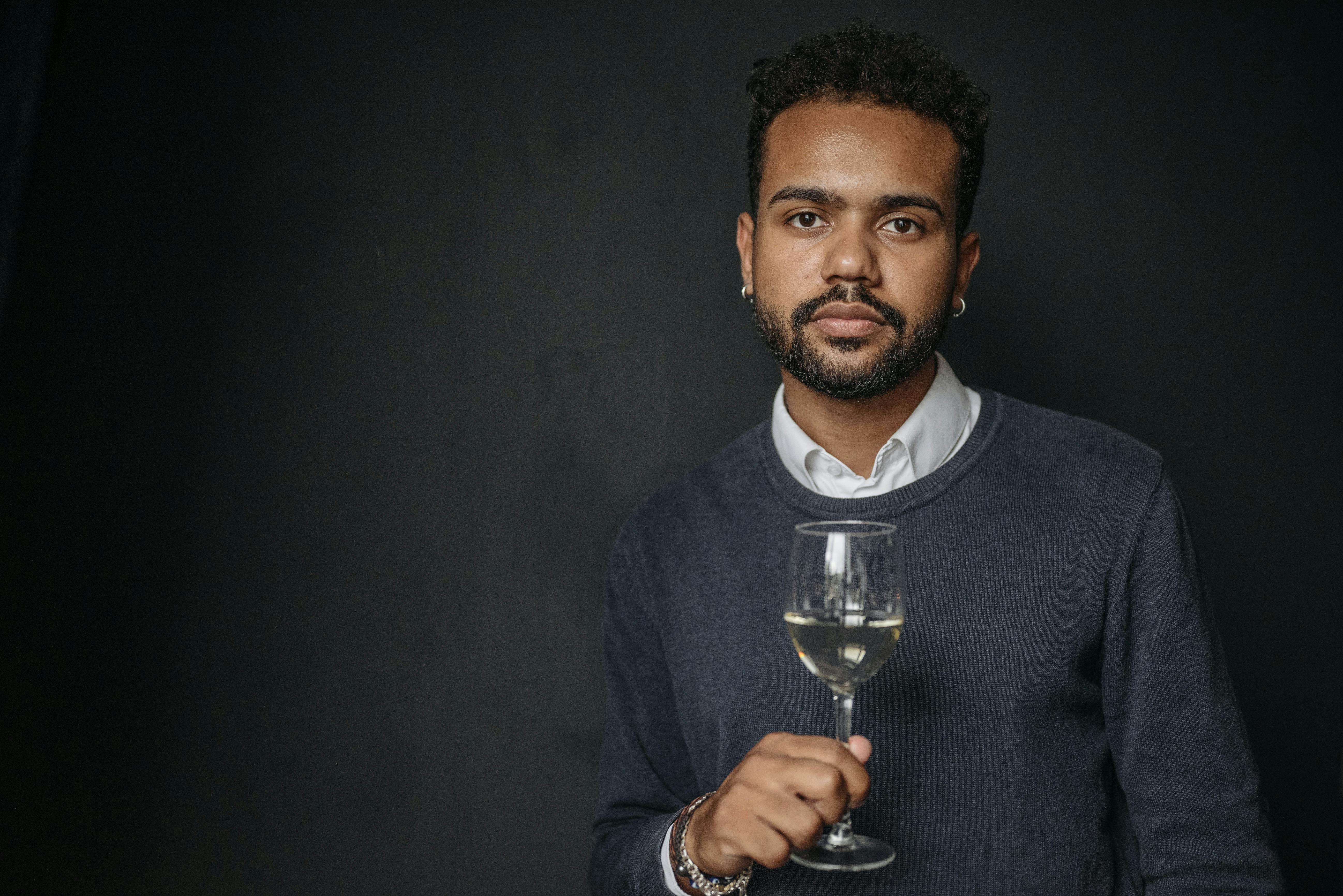 Soleier with Glass of White Wine · Free Stock Photo
