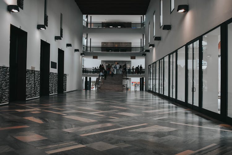 People On Stairs In An Office Building 