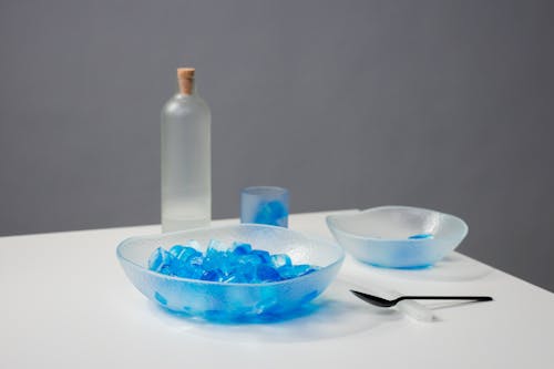 Blue Ice Cubes in a Glass Bowl