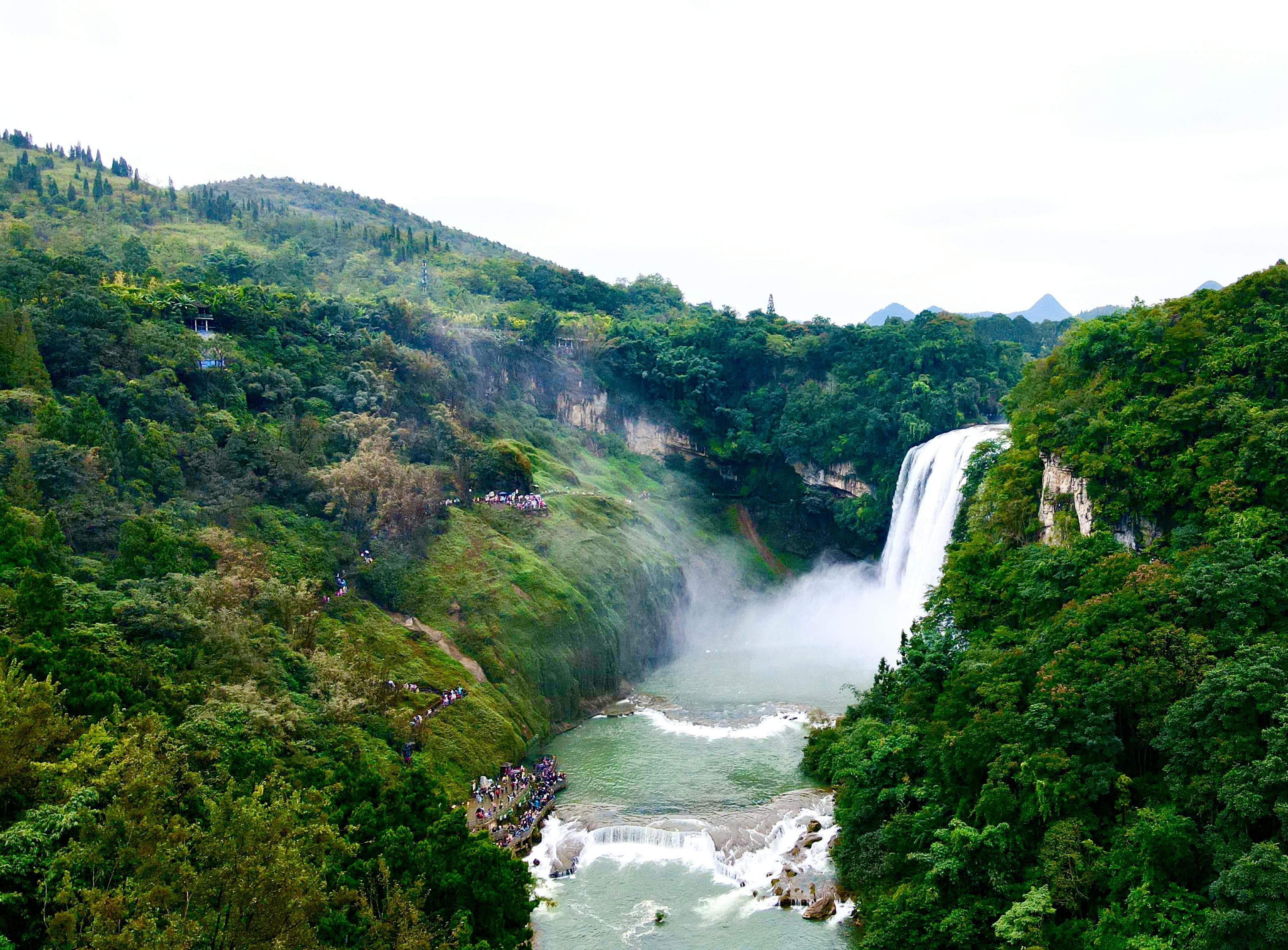 green landscape with waterfall