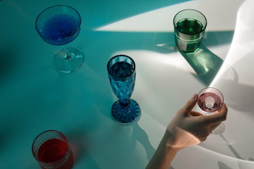 Assorted Drinking Glasses with Liquids