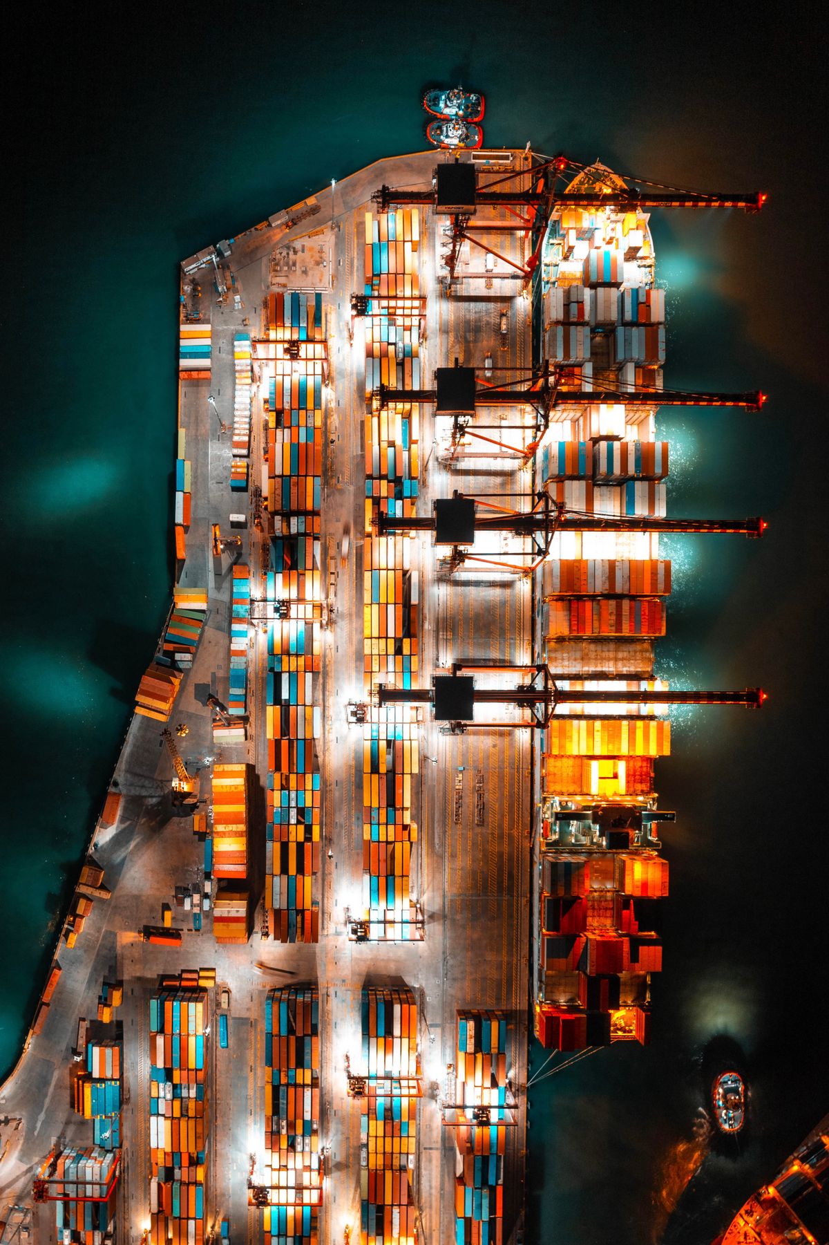Aerial view of a container freighter loaded with cargo containers at port