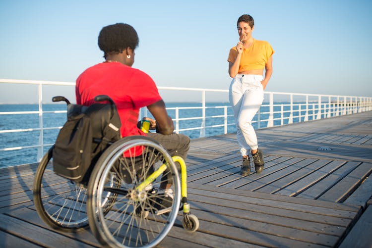 A Man And A Woman On The Boardwalk