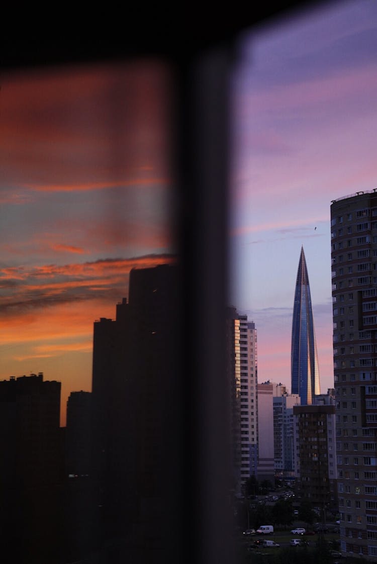 Abstract Image Of Skyscrapers Seen Through A Window At Dawn