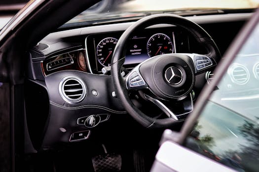 Elegant Mercedes-Benz interior featuring sleek design and advanced dashboard.
