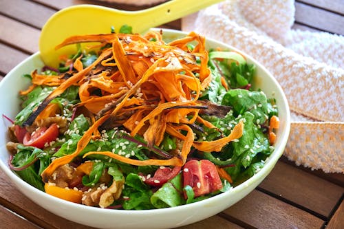 Delicious Vegetable Salad on White Ceramic Bowl