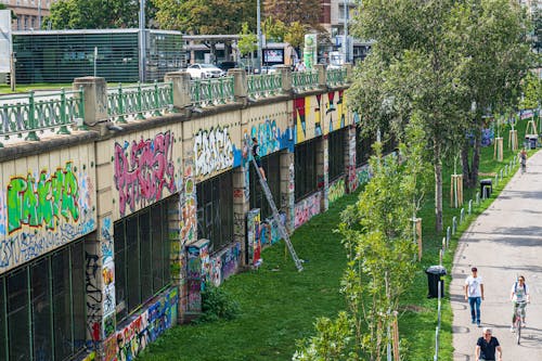 Free stock photo of graffiti art, green trees, street