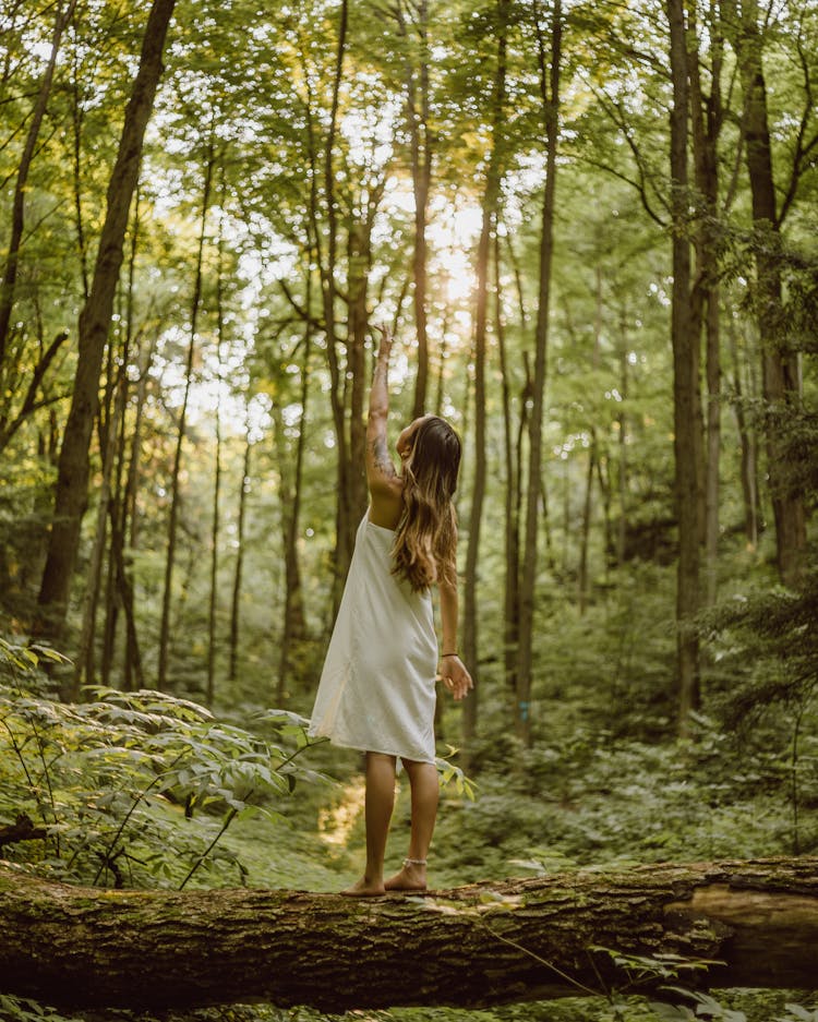 Backside Of A Woman In The Forest