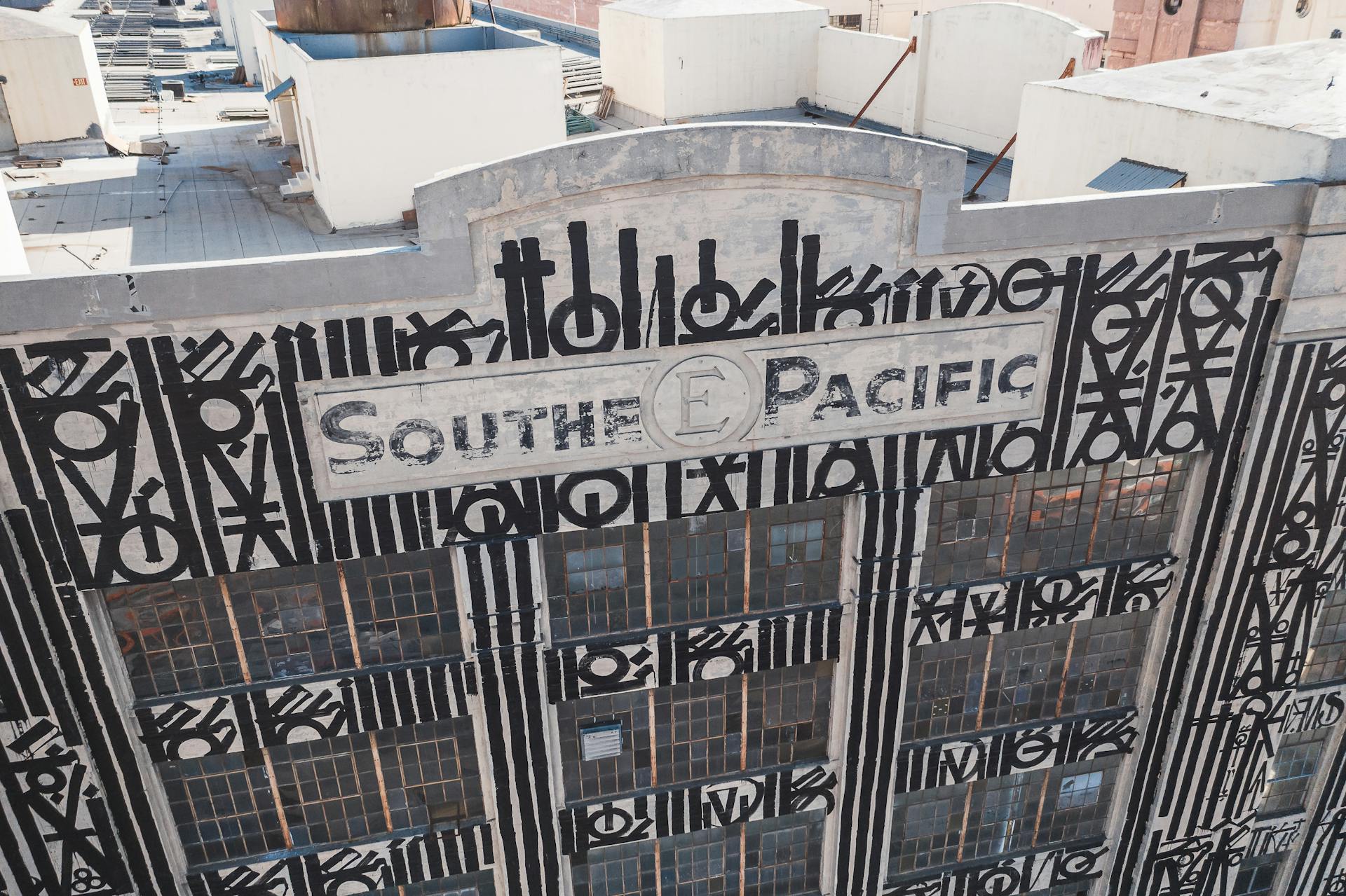 Aerial view of the Southern Pacific building facade with distinctive Art Deco design.