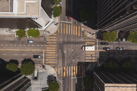 Overhead shot of a bustling crossroad in downtown Los Angeles, California.