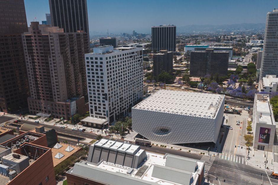 Outstanding California Coast and Canyons 35-Minute Helicopter Tour Review Review 2026 - Aerial drone shot capturing the iconic architecture of downtown Los Angeles, featuring The Broad museum.