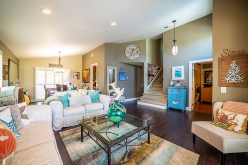Free Inviting living room interior with contemporary design, plush sofas, and decorative accents. Stock Photo