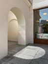 White Concrete Pillar Near Glass Window