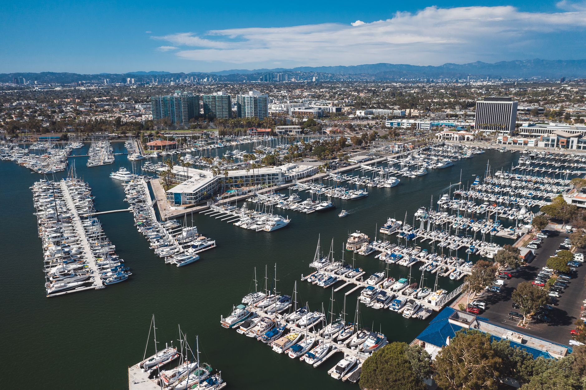 Luxury yacht moored along the California coast representing the ultimate Olympic hosting experience