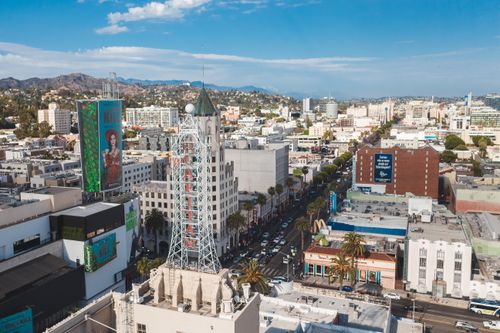 Free Aerial view of the vibrant cityscape of Hollywood, featuring famous landmarks and bustling streets. Stock Photo