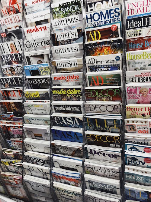 Assorted Magazines in Magazine Rack 