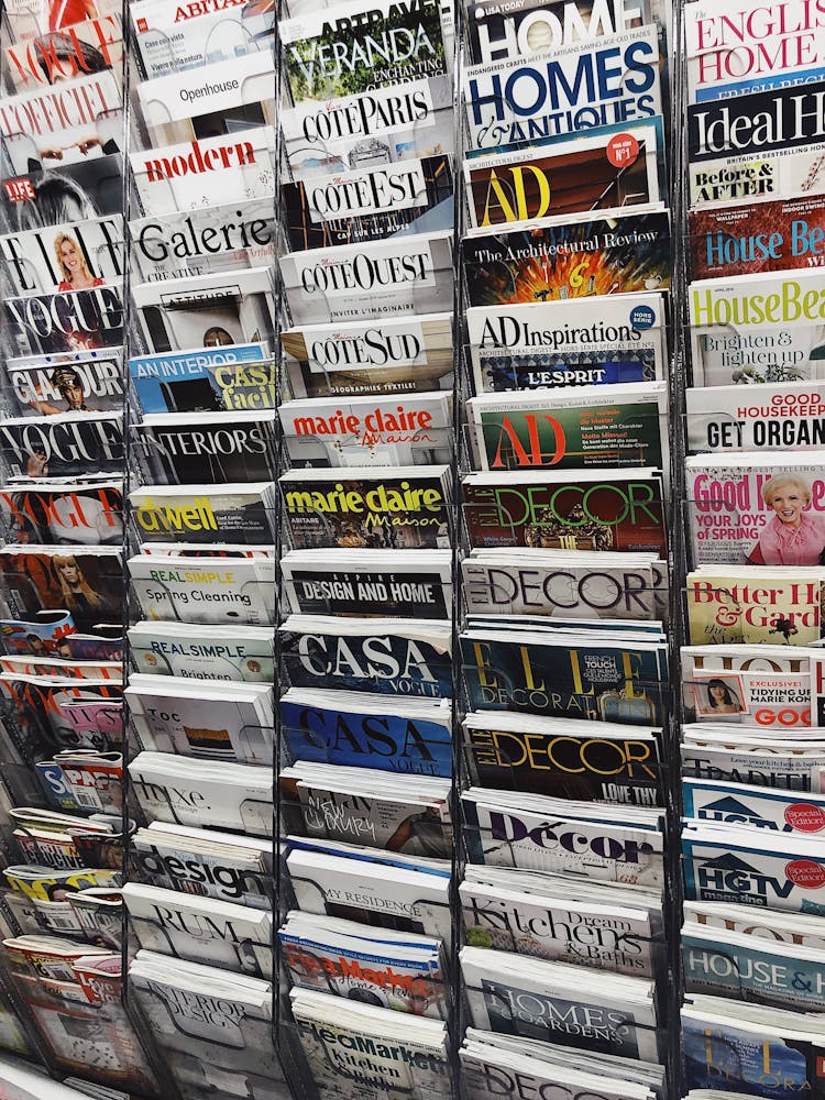 Assorted Magazines In Magazine Rack 