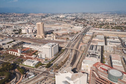 
An Aerial Shot of Buildings and a Highway in a City