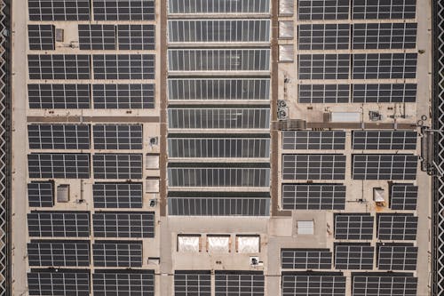 
An Aerial Shot of Solar Panels on a Rooftop