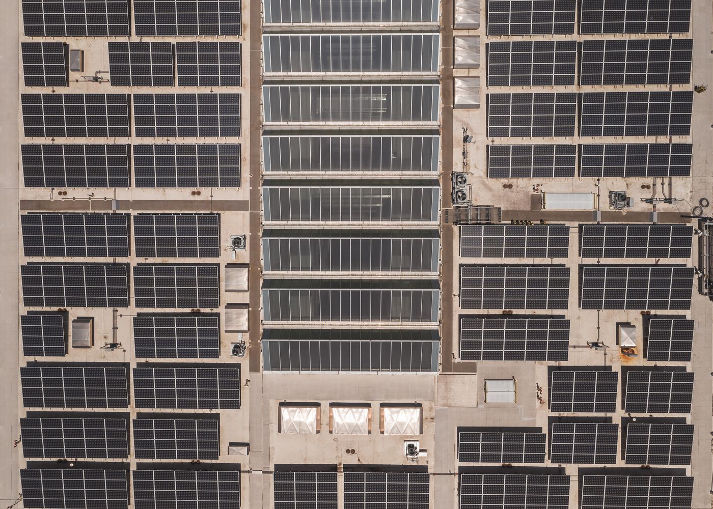 Aerial view of a large commercial rooftop solar plant