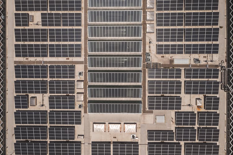 
An Aerial Shot Of Solar Panels On A Rooftop