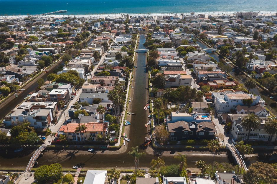 A stunning aerial view of the Venice Canals district in Los Angeles on a sunny day.