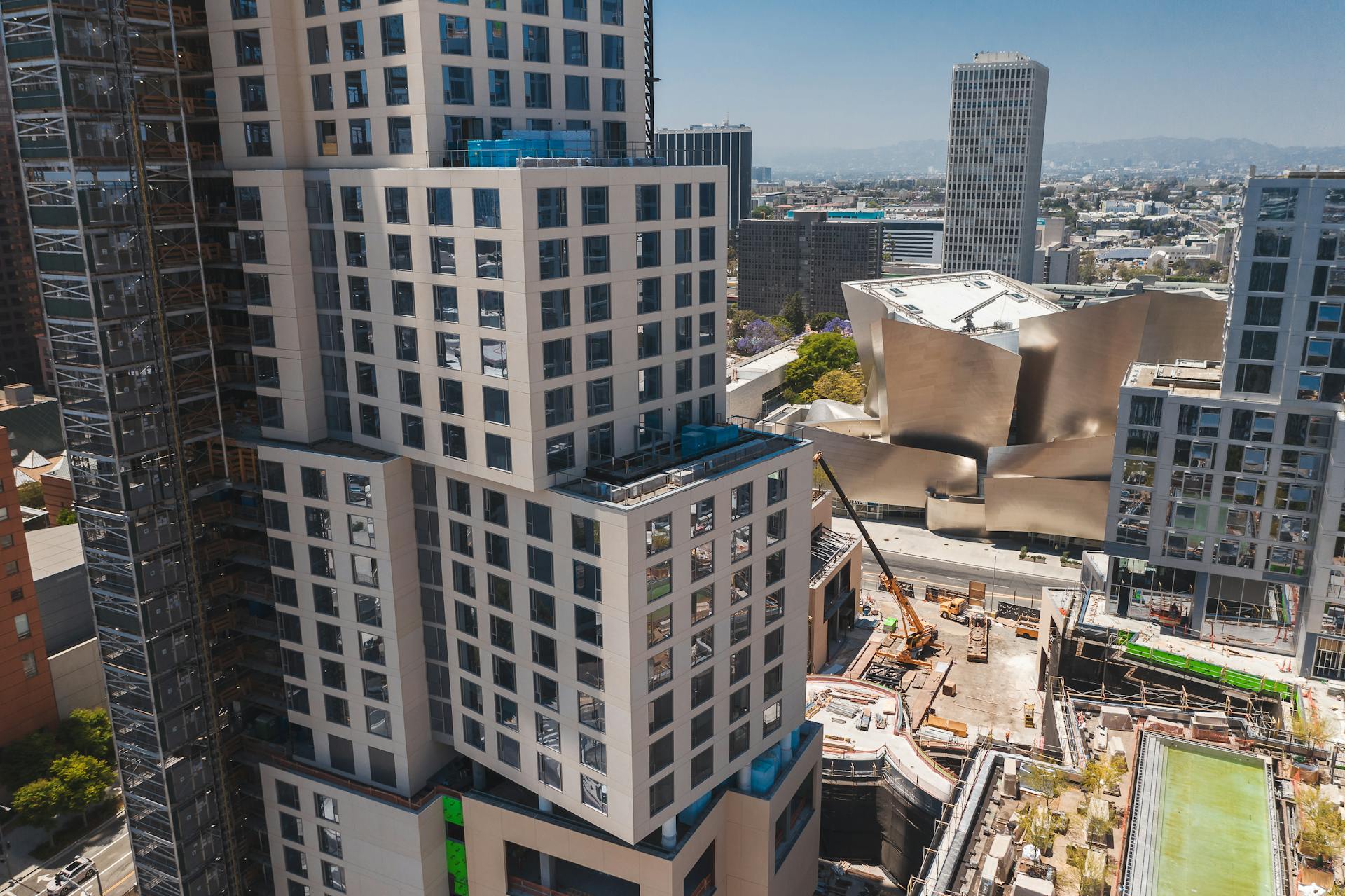 Architectural view of downtown Los Angeles with modern high-rise buildings and urban landscape.