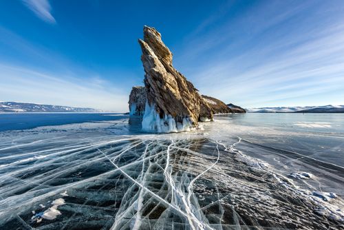 Free Experience the breathtaking beauty of Lake Baikal's icy landscape captured in winter light. Stock Photo