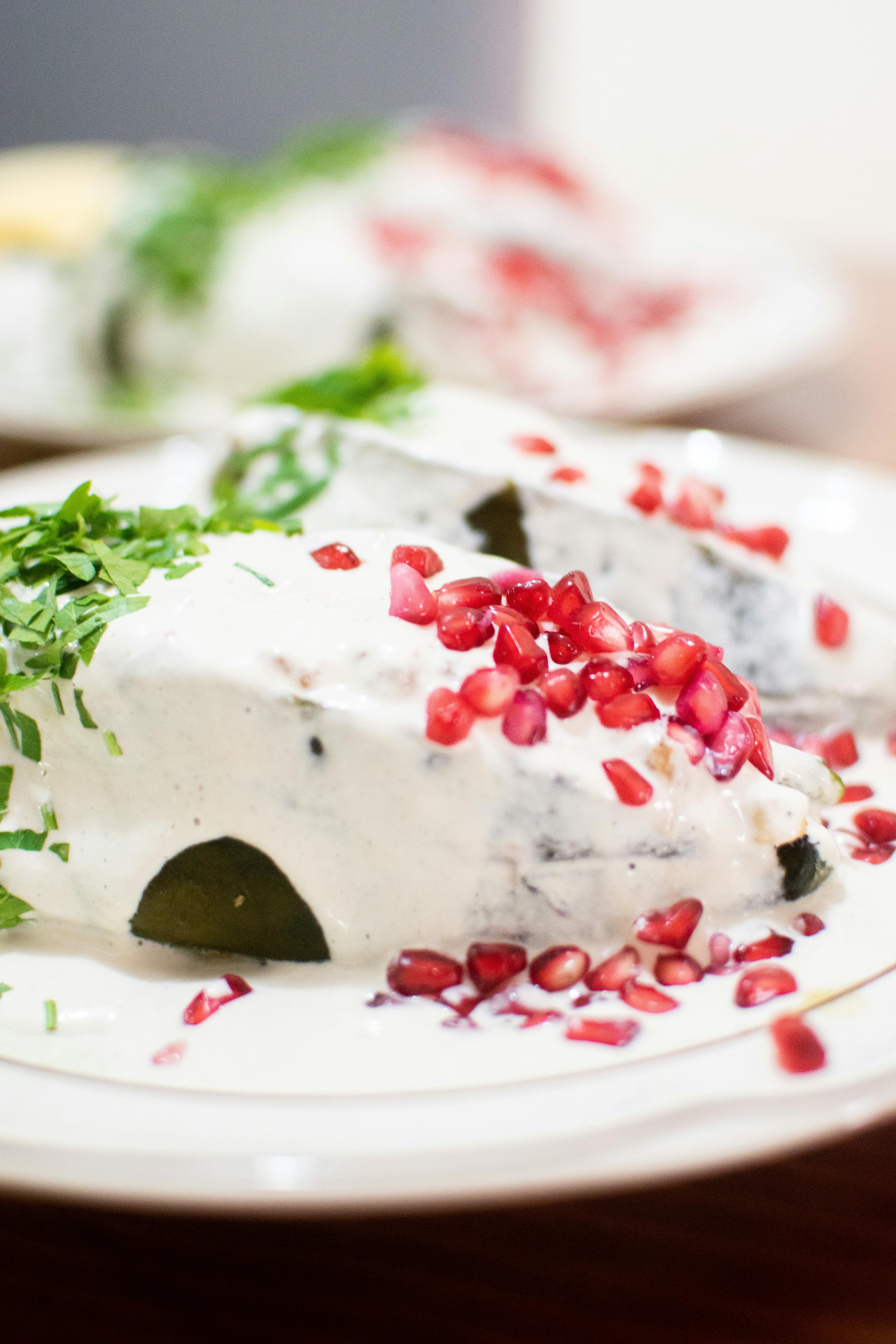 chiles en nogada with pomegranate