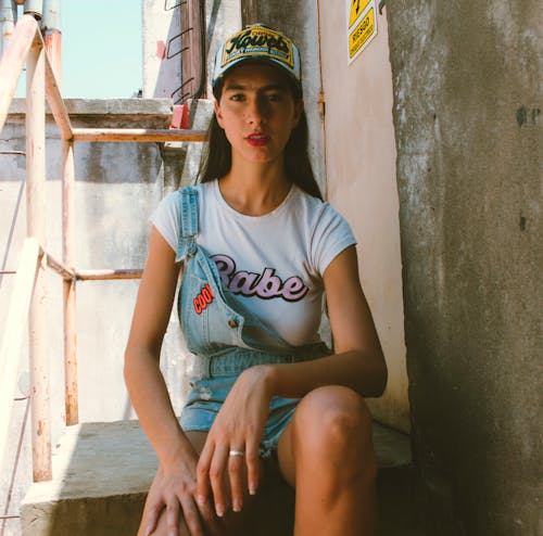 Siting Woman Wearing White Shirt