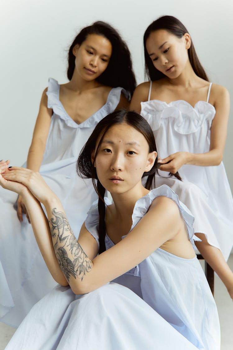 Three Girls In White Dresses