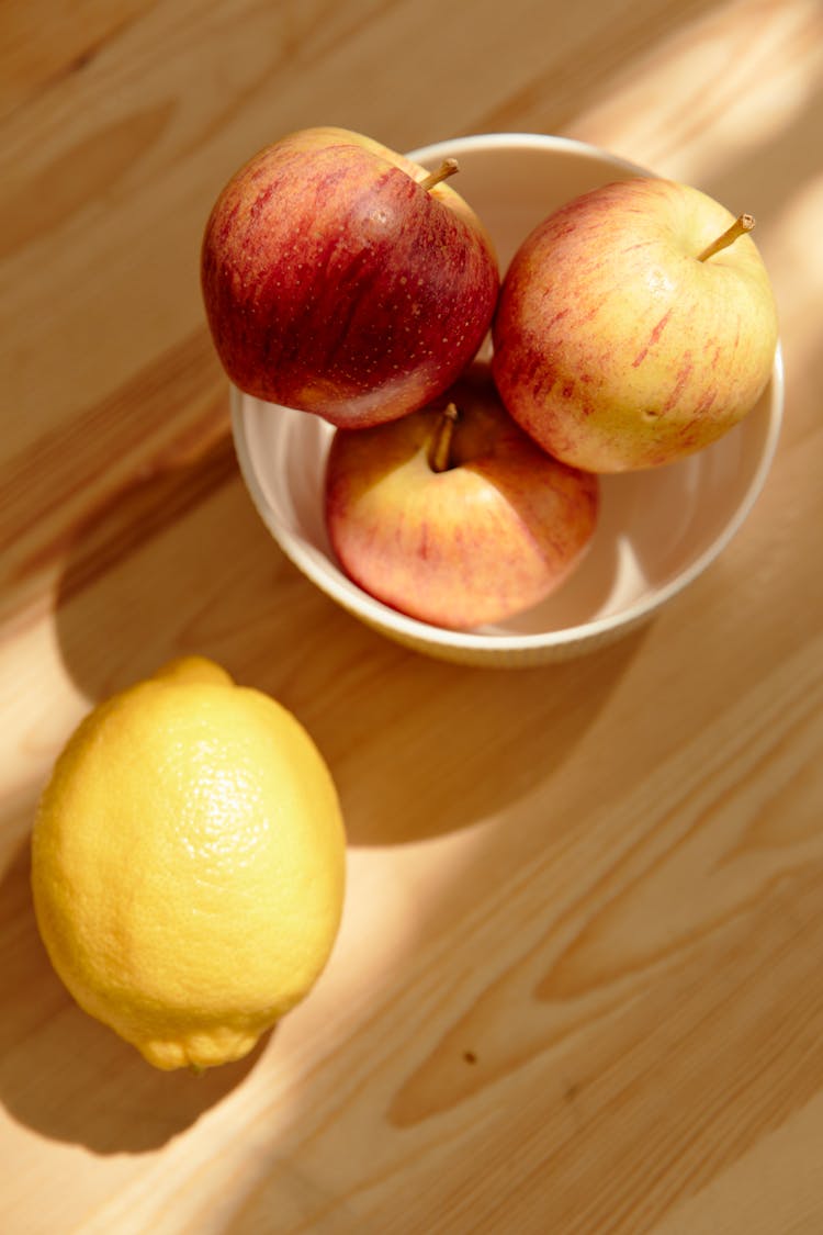 Top View Of Apples And A Lemon