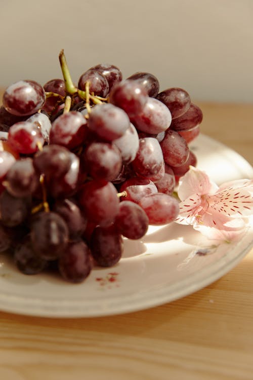 Fresh Grapes on a Ceramic Plate