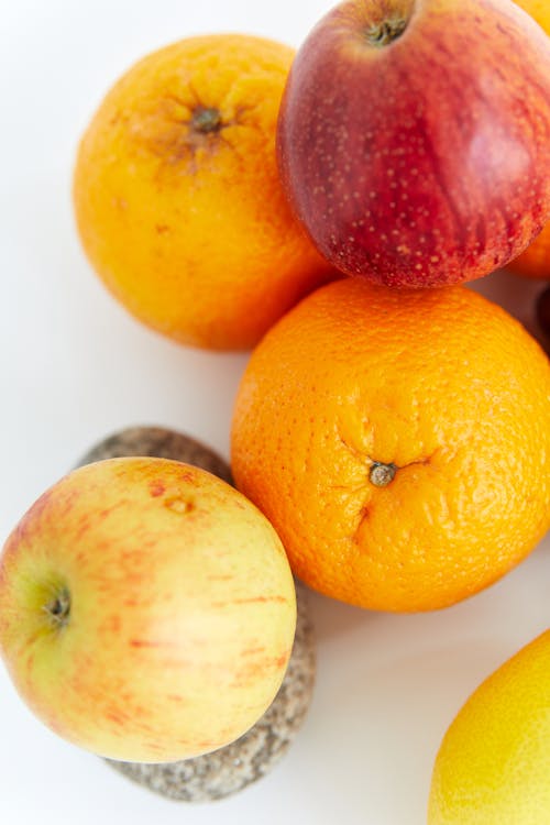 Free Orange Fruits on White Surface Stock Photo