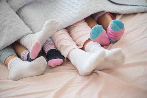 Free Photo of Children's Feet with Socks Stock Photo