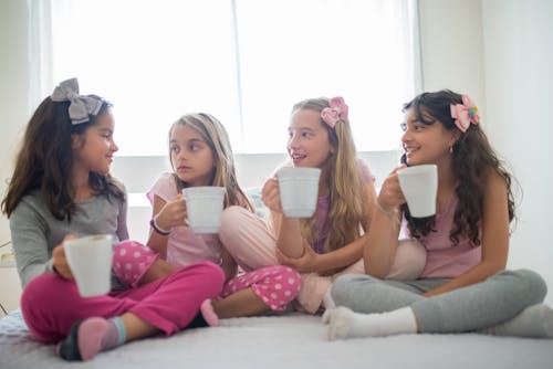 Free Photo of Girls Holding White Cups Stock Photo