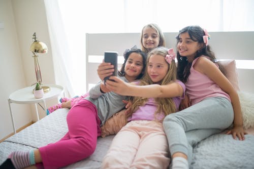 Free Girls in Pajamas Taking Selfie Stock Photo
