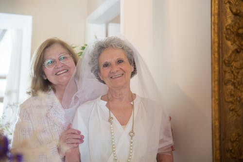 Free Woman with a Bride Smiling Together Stock Photo