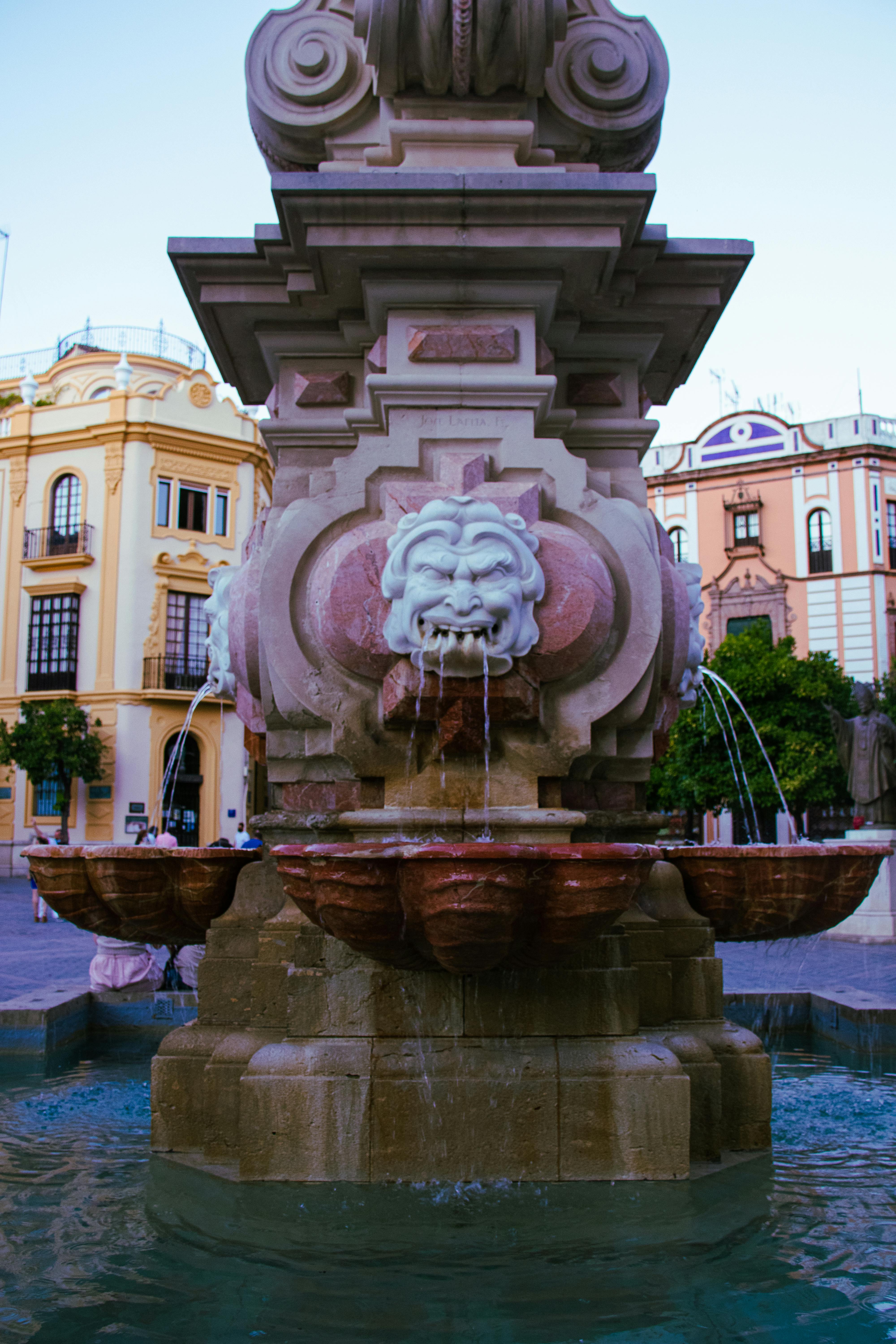 fountain made of pink marble in seville